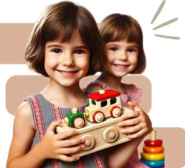 Two young girls smile at the camera; the one in front holds a wooden toy train, while the other stands behind her. Colorful stacking rings appear in the background.